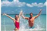 No, this isn’t me or Denise, . But they sure look happy frolicking in the ocean in the Bahamas. We will, too!